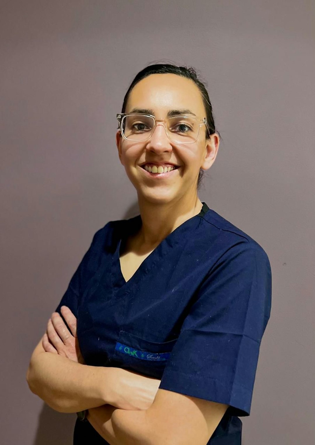 MONL consultation CTA Smiling nurse in scrubs — build capability that lasts with MONL