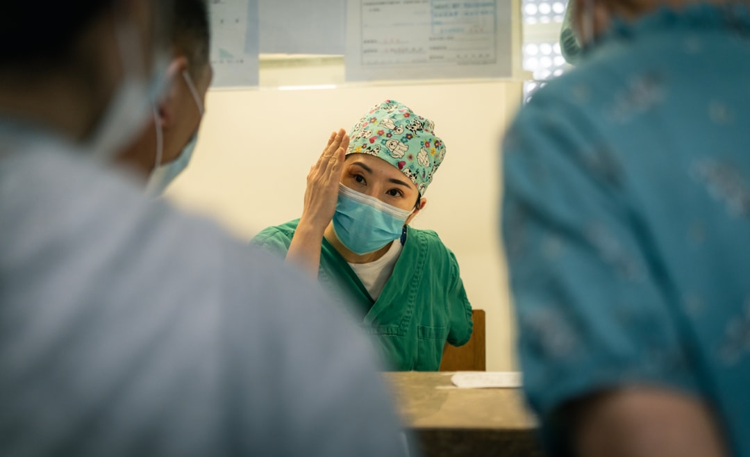 Nurse caring for a patient in a GCC hospital — nursing workforce retention